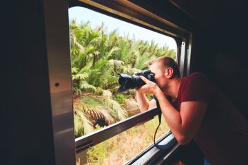 Man traveling by historical train